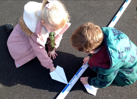 Year 1 and 2 measuring the length their planes flew.